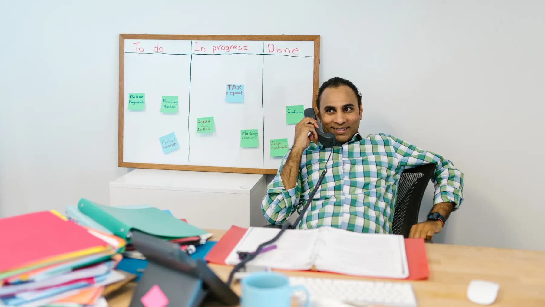 A collaborative planning session around a shared task board